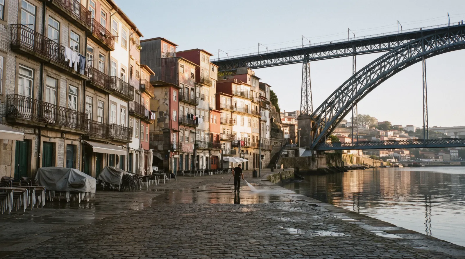 The tall painted houses of the Ribeira quay in Porto, Portugal, seen across the Douro from the Gaia bank
